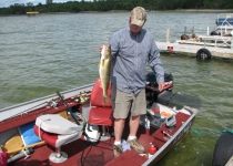 jim in boat w walleye