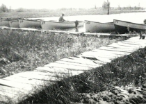 Wooden boats in bay at SWR 1940's